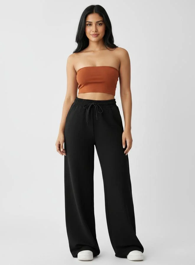 تايك تو Black Solid Relaxed Wide Leg Joggers By Gravt