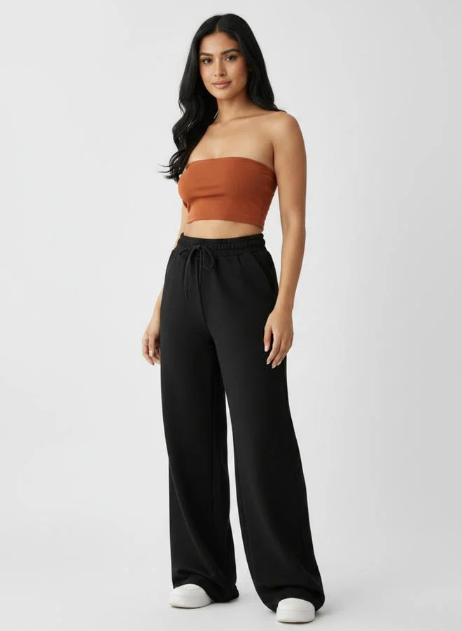 تايك تو Black Solid Relaxed Wide Leg Joggers By Gravt