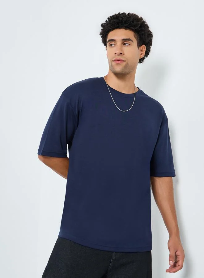Styli Men Navy Graphic Print Oversized T-Shirt