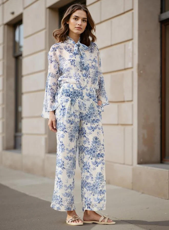 ايكونيك قميص بطبعة زهور أيقونية مع تفاصيل فيونكة وأكمام الجرس