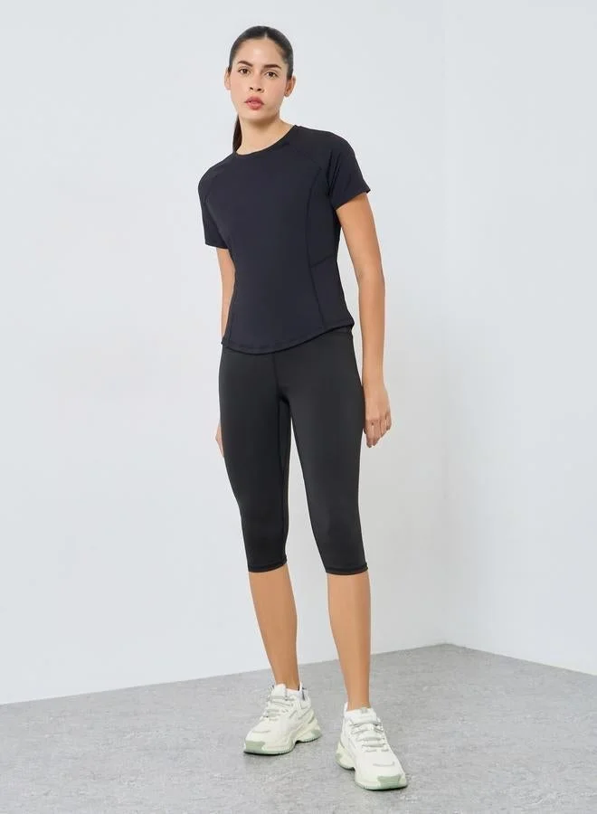 ستايلي اكتيف بلوزة بحافة مُنحنية