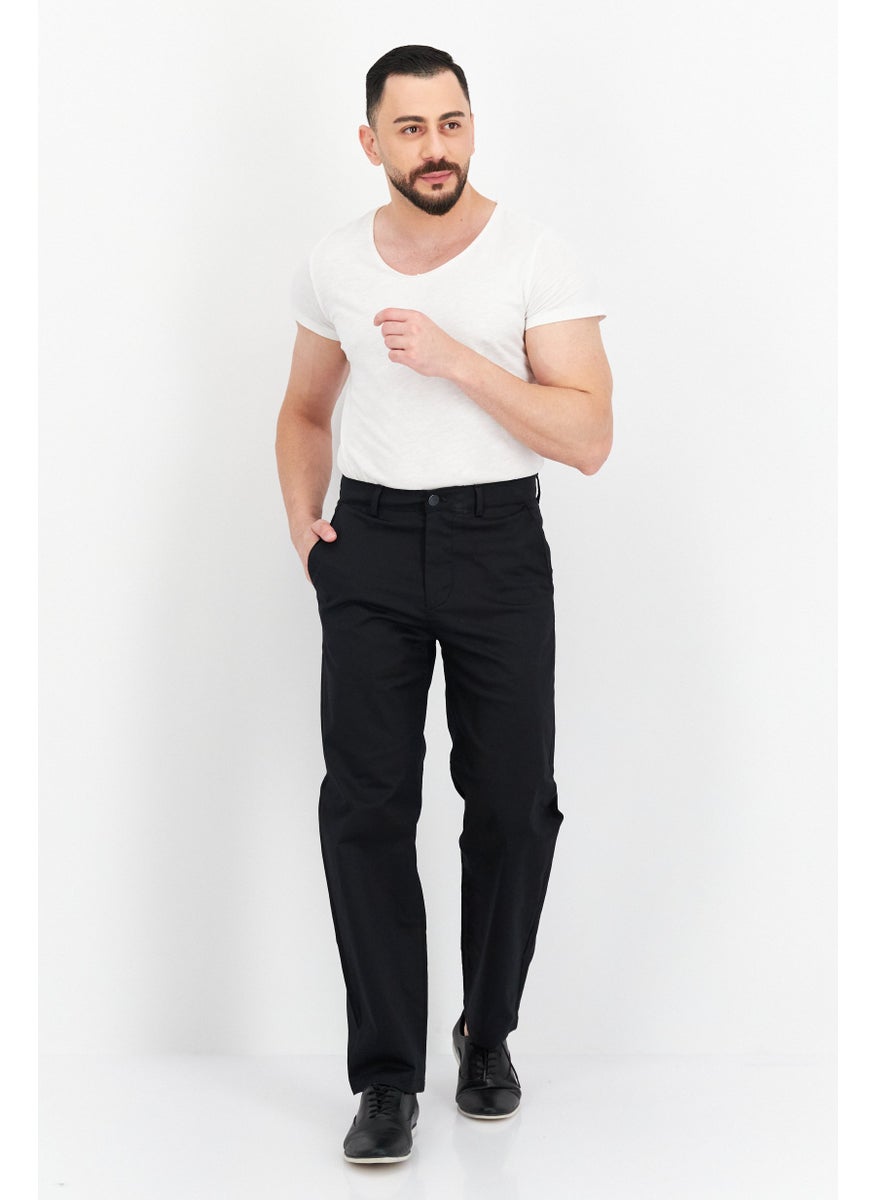 Men Loose Fit Solid Chino Pants, Black - pzsku/Z70E76169BC091363D589Z/45/_/1729779465/077fb11a-44ec-49a4-9fad-c9fe3e228c4c