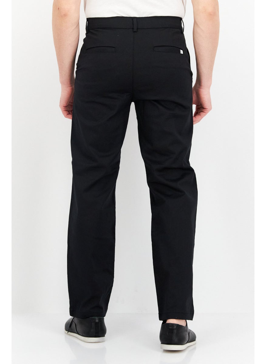 Men Loose Fit Solid Chino Pants, Black - pzsku/Z70E76169BC091363D589Z/45/_/1734272044/1b5c57ce-fe45-4eb0-84eb-e3a1ea72f32e