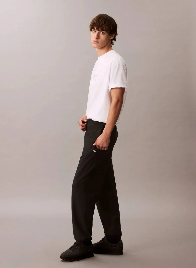 Calvin Klein Jeans Black Cotton Terry Monogram Joggers for Men | Best Price UAE