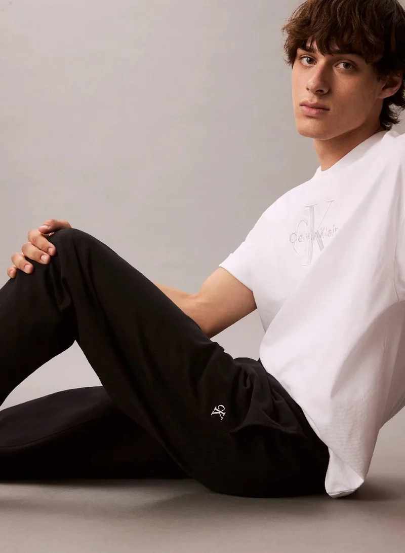 Calvin Klein Jeans Black Cotton Terry Monogram Joggers for Men | Best Price UAE