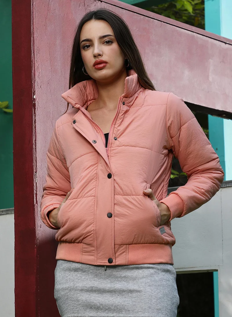 Campus Sutra Women's Salmon Pink Solid Puffer Jacket For Casual Wear | High Neck | Long Cuffed Sleeves | Button Closure | Jacket Crafted With Comfort Fit For Everyday Wear