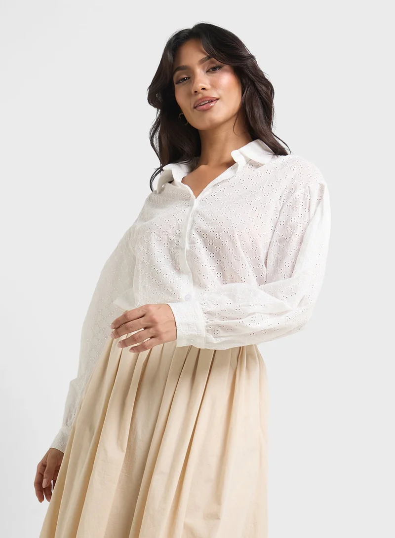 ايلا قميص بأزرار وأكمام منفوشة