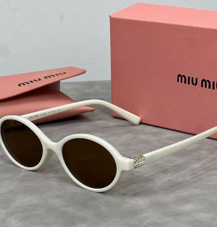 Italian-made Miu Miu oval luxury cycling sunglasses for women.