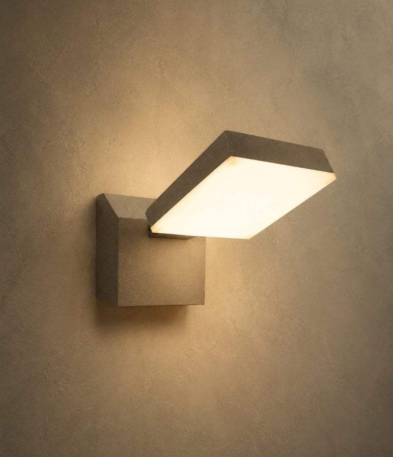 Modern square wall sconce with warm LED lighting - Image 1