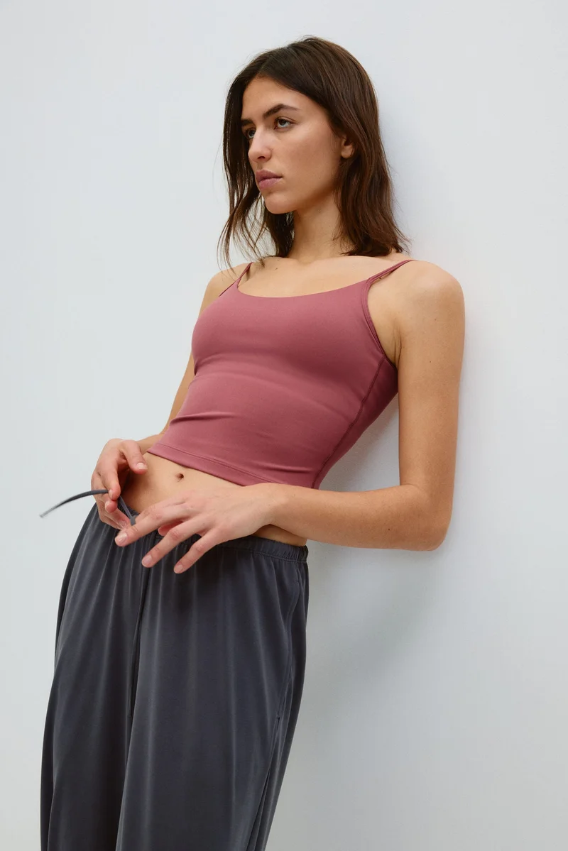 H&M  Integral-bra sports strappy top with SoftMove™ for Women | Best Price UAE