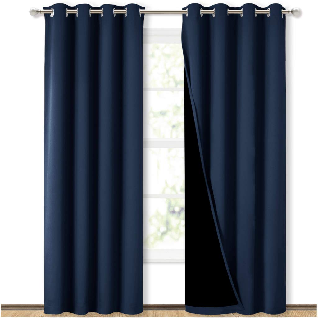 NICETOWN 100 Blackout Curtain Set Thermal Insulated Energy Efficiency Window Draperies for Guest Room Full Shading Panels for Shift Worker and Light Sleepers Navy Blue 52W x 84L 2 PCs