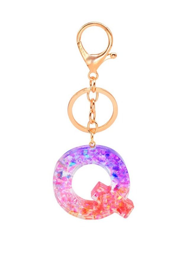 ميدالية مفاتيح بحرف  Q  من مادة الاي بوكسي - Image 1