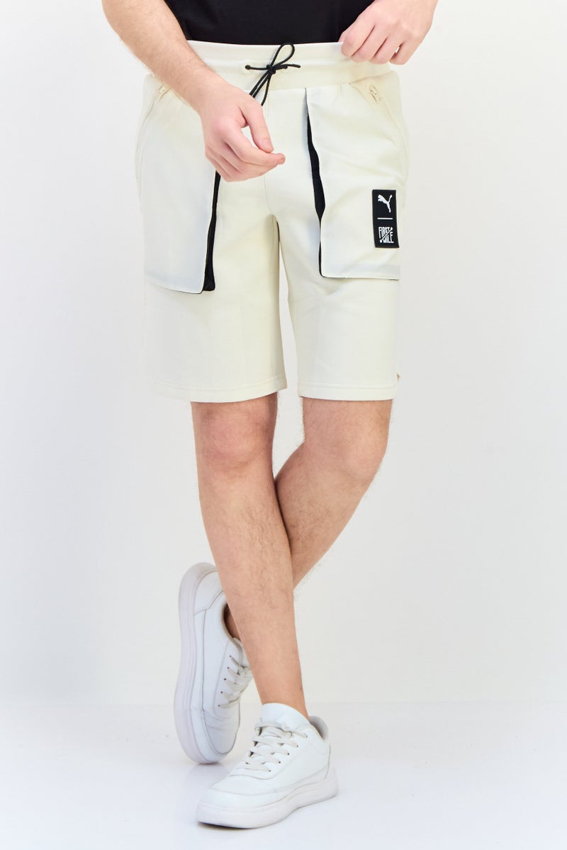 PUMA شورتات كارجو رياضية للرجال، ملائمة، خارجية، عاجي - Image 1