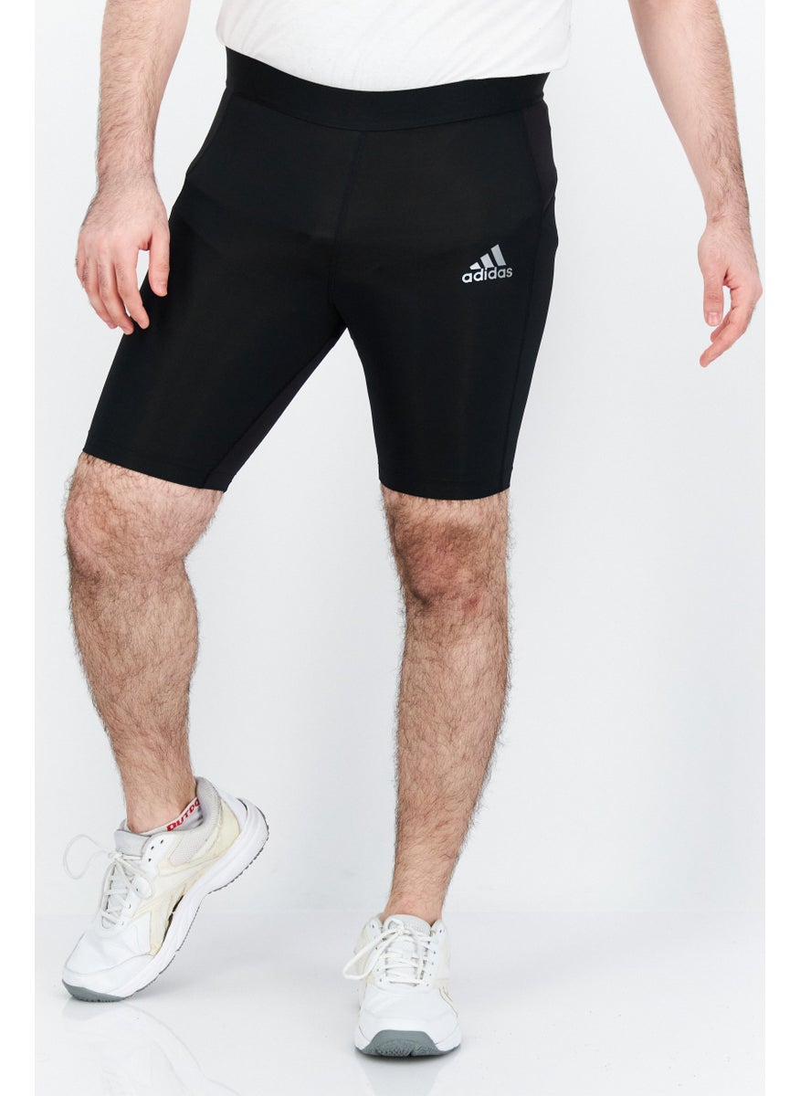 Adidas - شورت تدريب ضيق مناسب للرجال بشعار العلامة التجارية، أسود - Image 1
