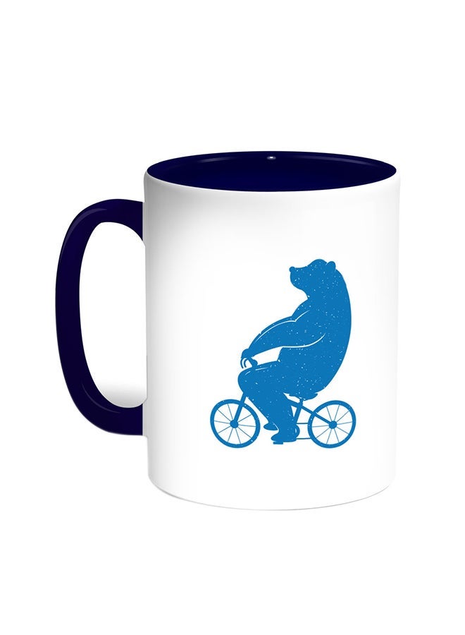 RYN Bear Driving A Bicycle Printed Coffee Mug Blue/White 11ounce