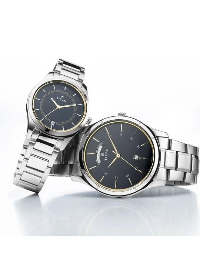 TITAN Bandhan Quartz Analog with Day & Date Blue Dial Silver Stainless Steel Strap Couple Watch - 17672596SM01