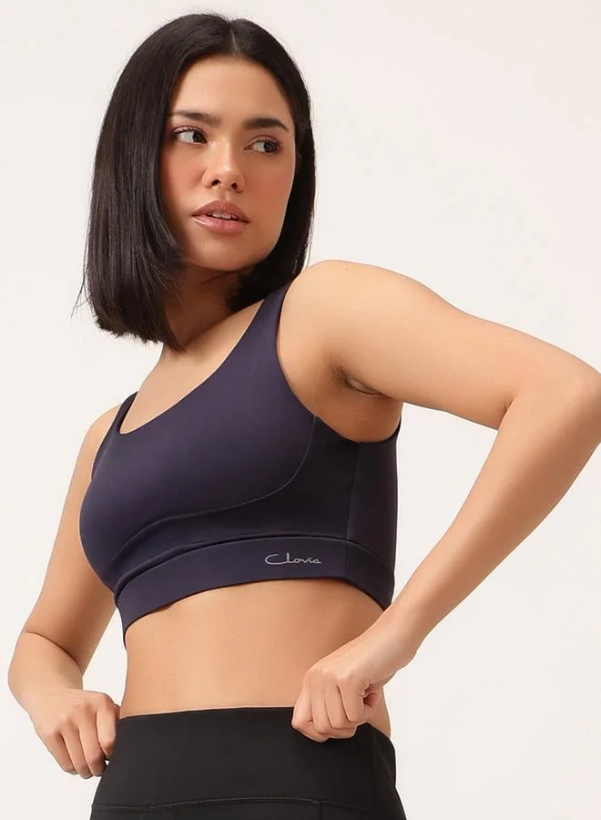 Clovia  Navy Blue Solid Medium Impact Sports Bra with Removable Cup for Women | Best Price UAE