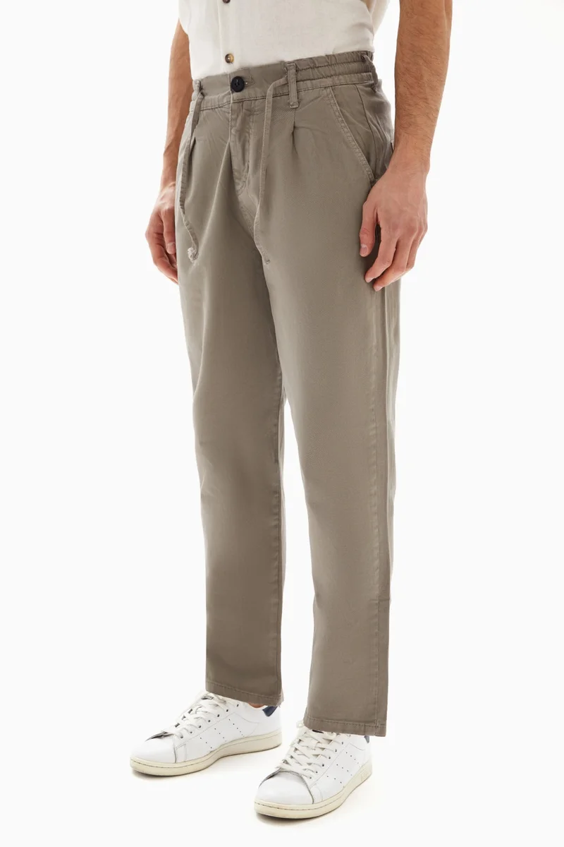 Wecre8 Taupe Drawstrings Slim Trousers By WECRE8
