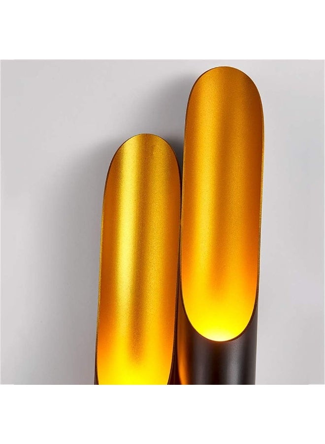 Modern wall sconce with top and bottom lighting in a distinctive cylindrical design - black and gold color - Image 4