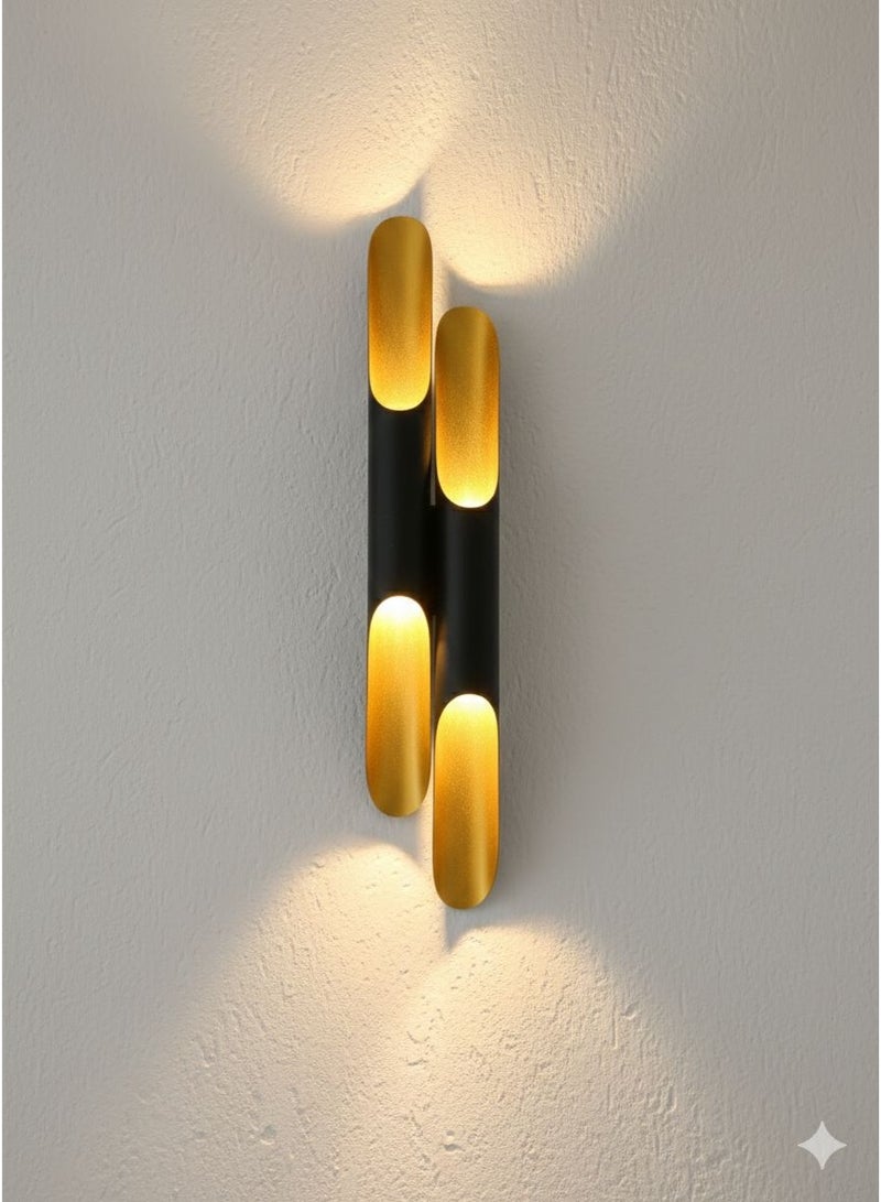Modern wall sconce with top and bottom lighting in a distinctive cylindrical design - black and gold color - Image 1