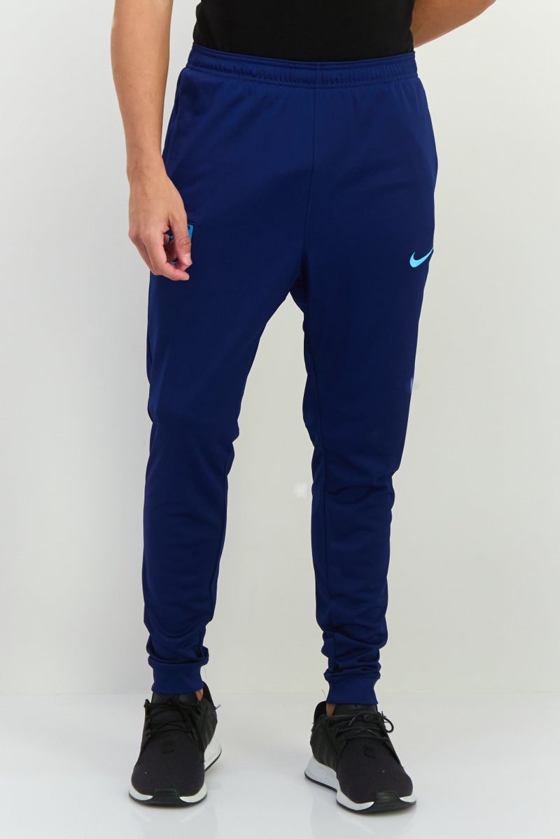 Nike Men Slim Fit Outdoor Track Pants, Blue - Image 1