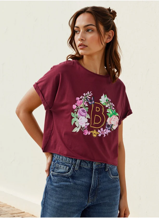 اس بي كاركترز Floral Print Cropped T-shirt with Crew Neck