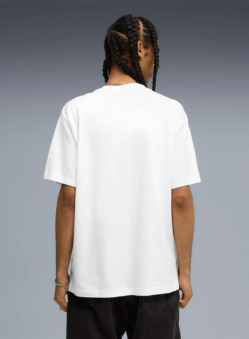 PUMA Graphic Super World Tour Relaxed T-Shirt