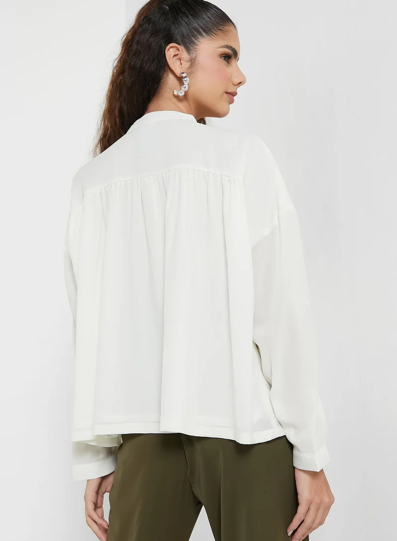 Ginger Solid Asymmetrical Hem Shirt