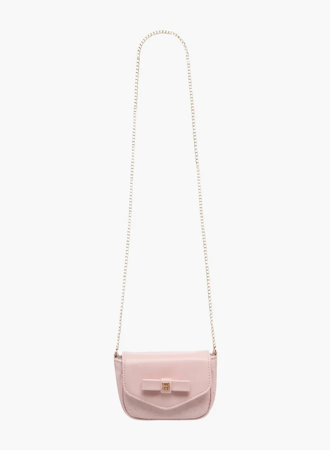 فلورا بيلا من شو إكسبرس Girls Bow Accent Crossbody Bag with Chain Strap and Flap Closure