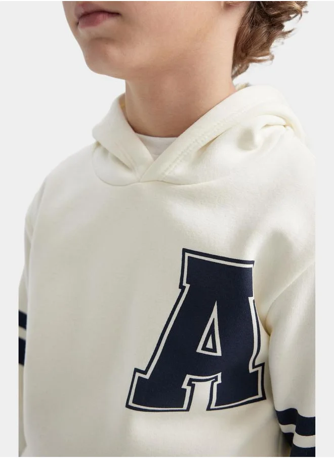 ديفاكتو Graphic Print Hooded Sweatshirt & Joggers Set by Styli