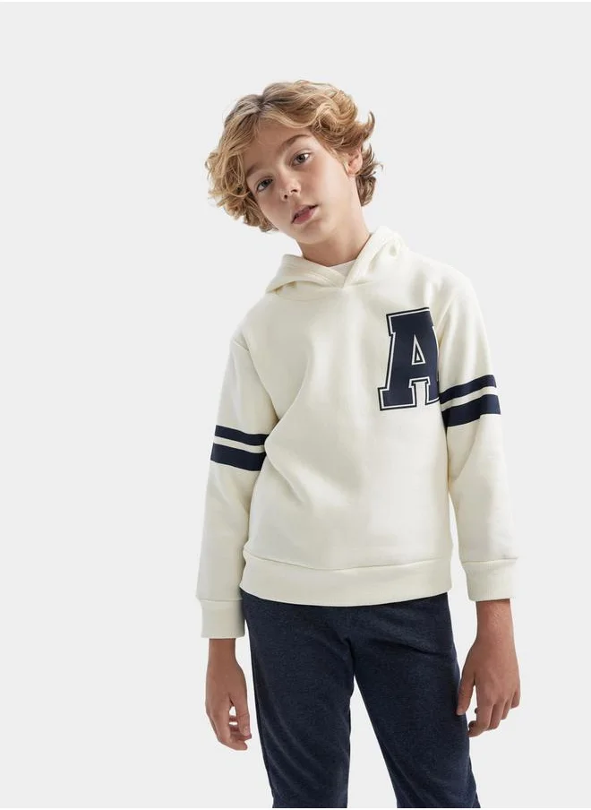 ديفاكتو Graphic Print Hooded Sweatshirt & Joggers Set by Styli