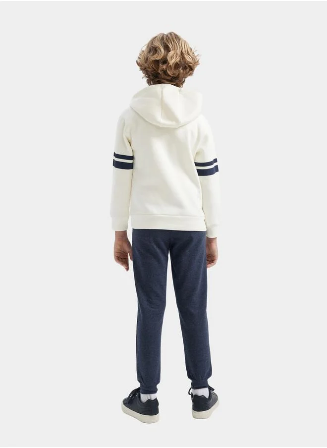 ديفاكتو Graphic Print Hooded Sweatshirt & Joggers Set by Styli