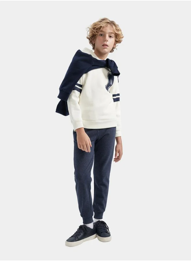 ديفاكتو Graphic Print Hooded Sweatshirt & Joggers Set by Styli