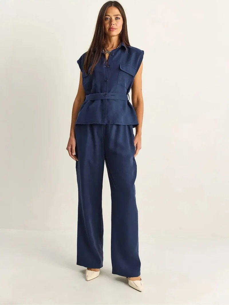 بيانكو لوتشي LUCCI Belted Sleeveless Blouse And Wide-Leg Trousers Set