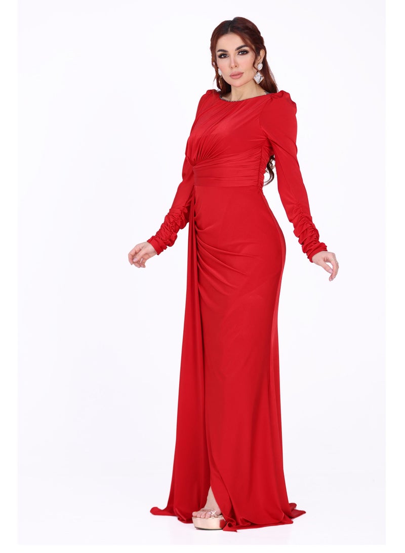 Modern Design An elegant and soft evening dress with long sleeves. This dress is characterized by its elegant design and an opening at the bottom of the dress for an attractive and elegant look.  - Image 3