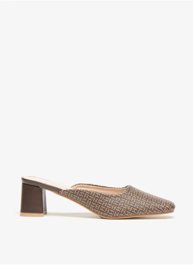 فلورا بيلا من شو إكسبرس Women's All-Over Monogram Print Slip-On Mules with Block Heels