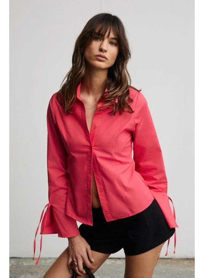 Grimelange JANETA Women's Shirt with Ruffle Detail, Slim Fit, Body-Hugging Pomegranate Flower Design.
