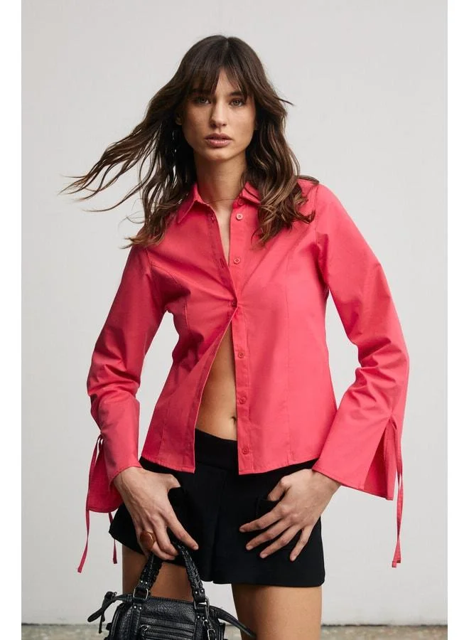 Grimelange JANETA Women's Shirt with Ruffle Detail, Slim Fit, Body-Hugging Pomegranate Flower Design.