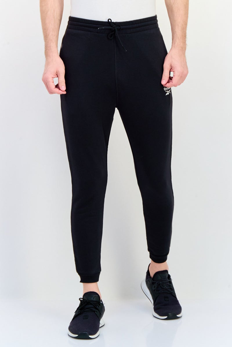 Reebok سروال رياضي للرجال مناسب في الهواء الطلق، أسود - Image 1