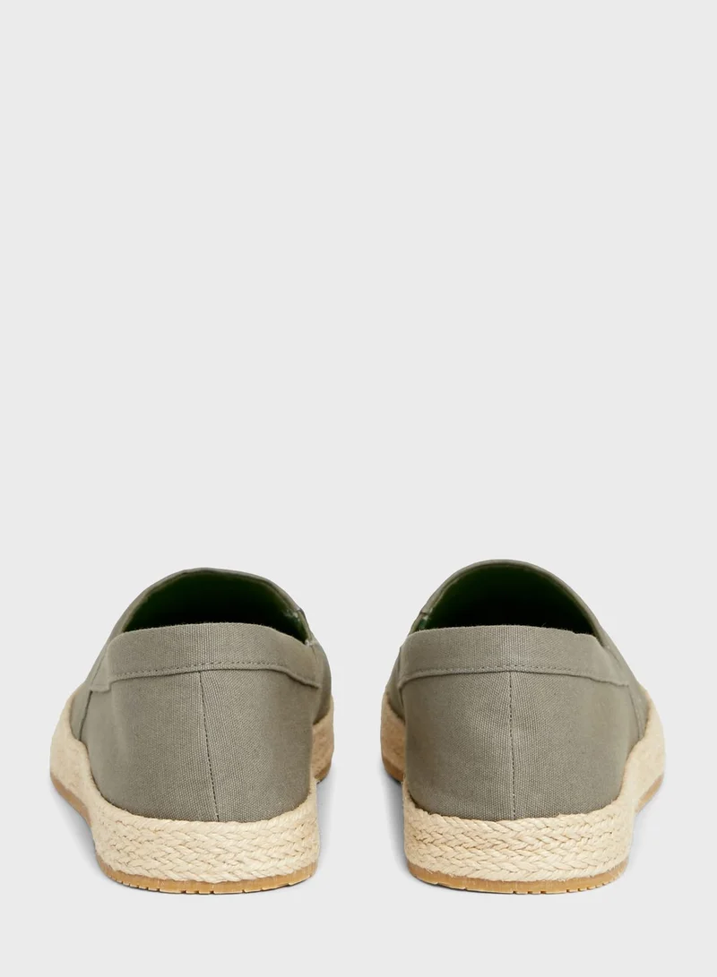 Calvin Klein Jeans Logo Slip Ons