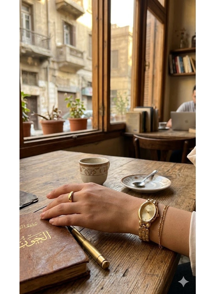 Guess Women's Elegant Gold-Tone Bracelet Watch with Champagne Sunray Dial - Image 2