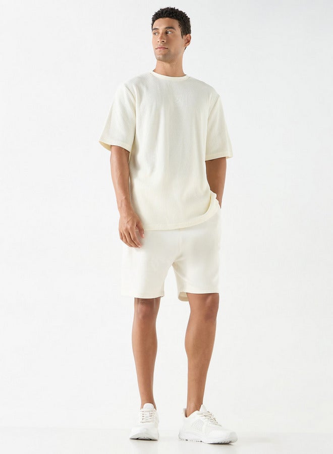 كابا تيشيرت بارز الملمس بياقة ضيقة وأكمام قصيرة من كابا - Image 2