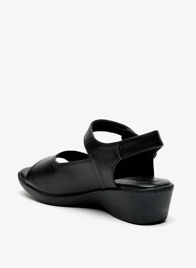 Le Confort Women's Solid Wedge Heel Sandals with Hook and Loop Closure