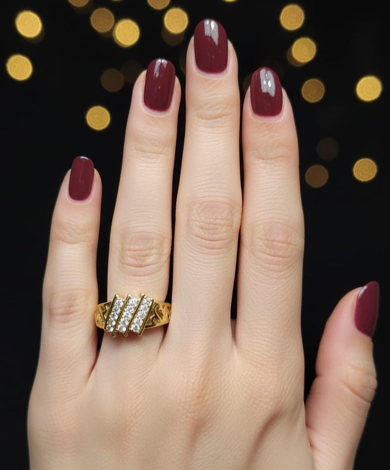 A stylish gold ring with a modern design. It features decorative side patterns and three diagonal lines adorned with sparkling zircon stones, and is open to fit all sizes. - Image 2