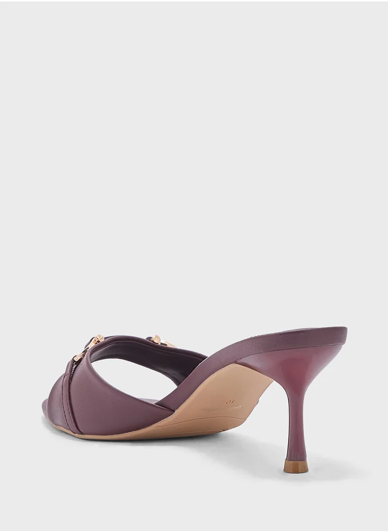 ايلا Horse Bit Trim Mule Heel Sandal
