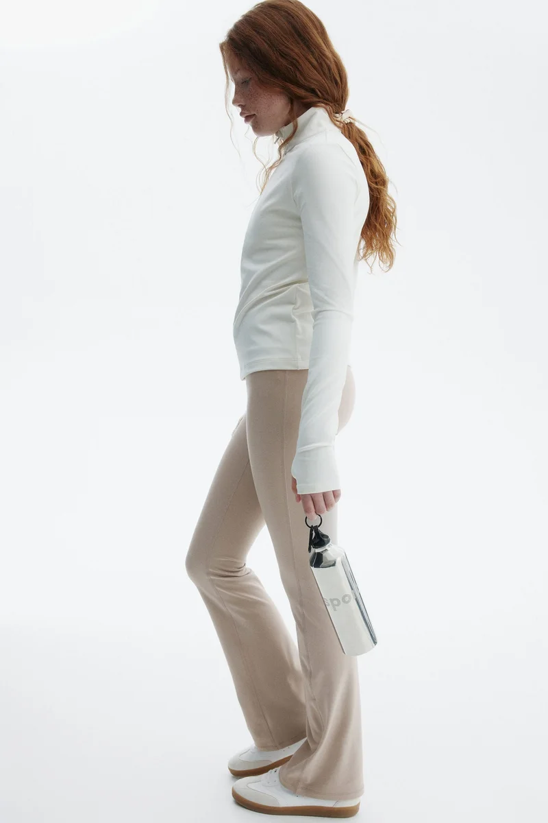 H&M Flared sports leggings with SoftMove™