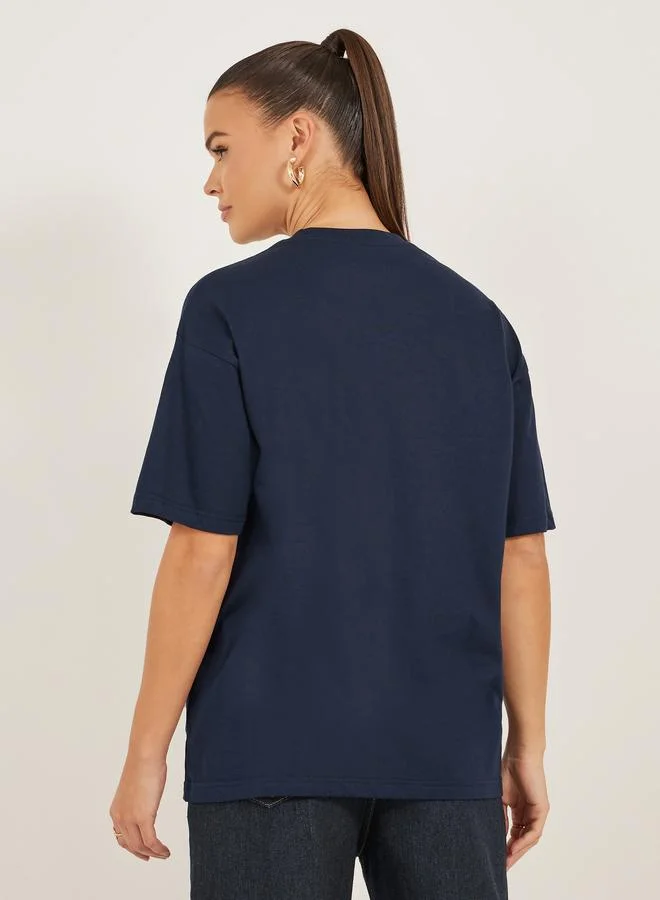 Styli Styli Floral Embroidered Detail Regular Fit T-Shirt with Pocket