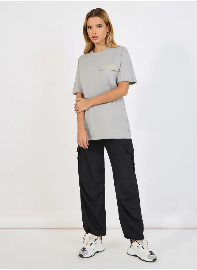 ستايلي Styli Oversized Forward Shoulder T-Shirt with Pocket and Short Sleeve