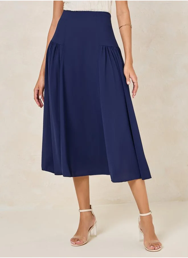 Styli Wide Waistband Plicated A-Line Midi Skirt