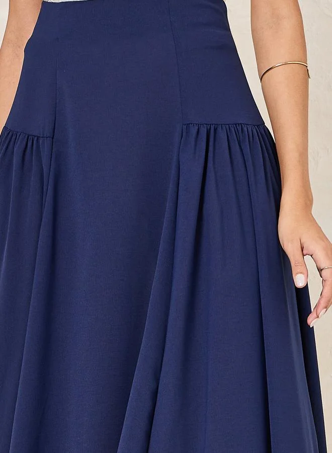 Styli Wide Waistband Plicated A-Line Midi Skirt